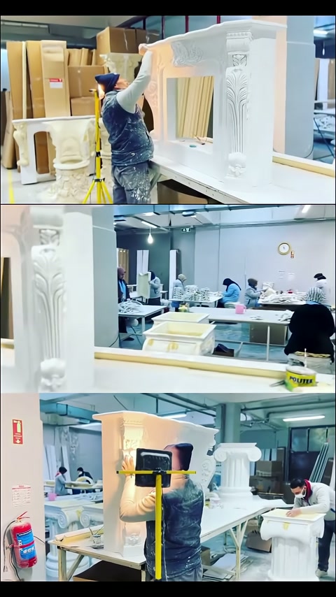 Craftsman carefully arranging the top molding of a large table body