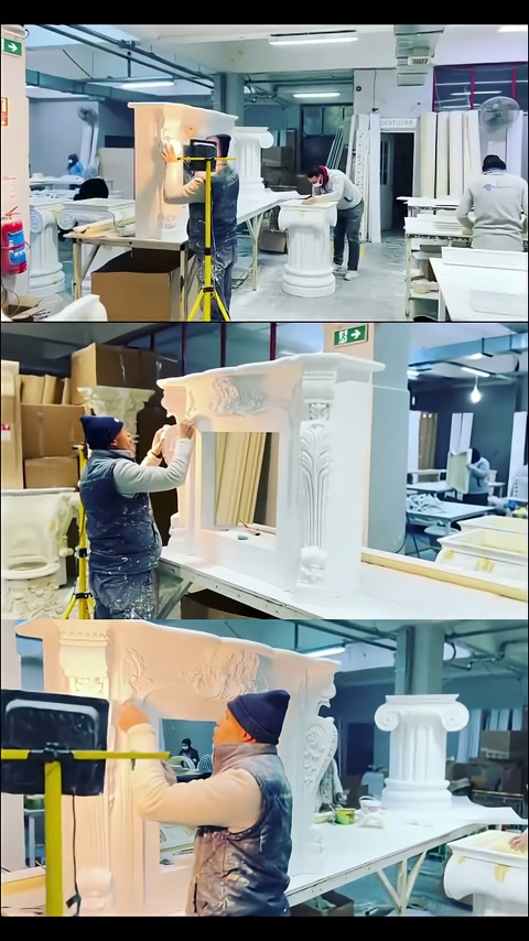 Surface finishing being applied to a table body surrounded by column-shaped legs