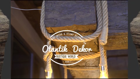Decorative wood-textured beam detail surrounded by ropes