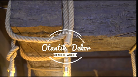 Wooden-textured horizontal beam completed with rope and lighting