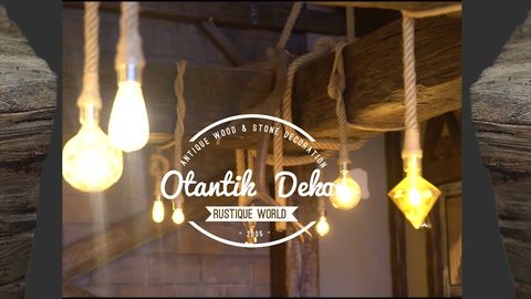 Wooden-textured ceiling beams illuminated with various pendant bulbs