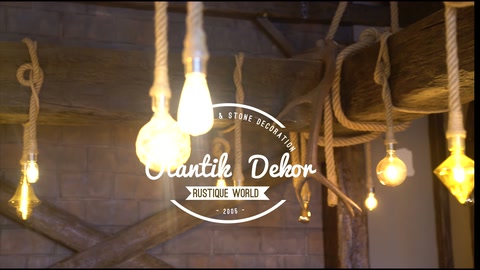 Ceiling surrounded by decorative logs displaying multiple bulb application