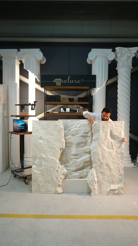 Three embossed sections are shown in an integrated arrangement on the workshop floor.