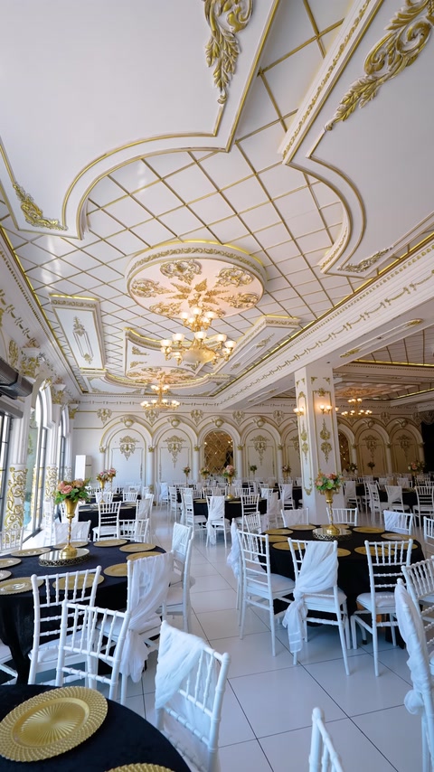 Bright reception hall integrated with geometric ceiling moldings