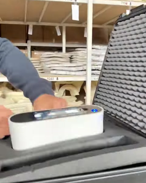 Handheld 3D scanner captures a detailed decorative architectural component