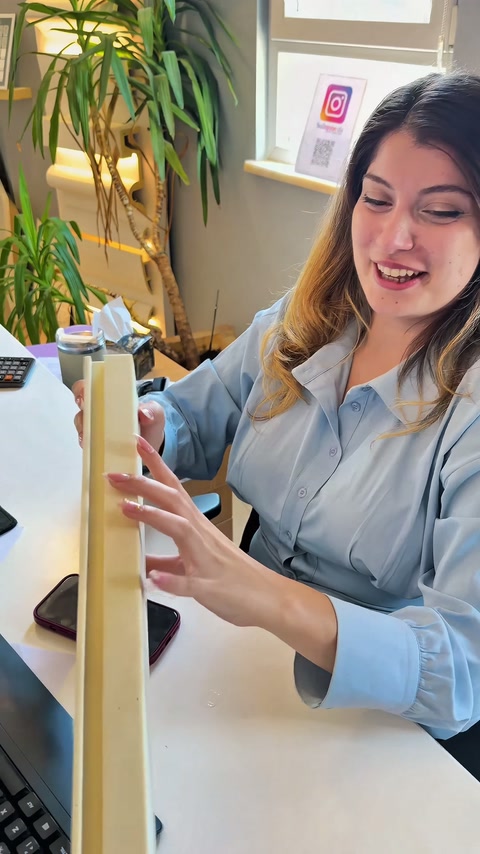 Long polyurethane section held at an angle to demonstrate its form