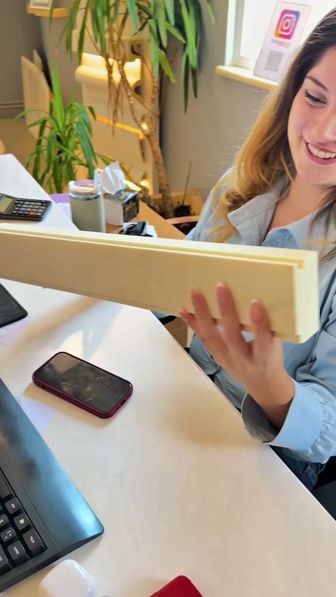 Polyurethane LED profile held horizontally to examine the broad surface