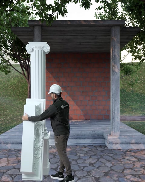 L'installatore posiziona il secondo pezzo di colonna vicino alla struttura della pergola.