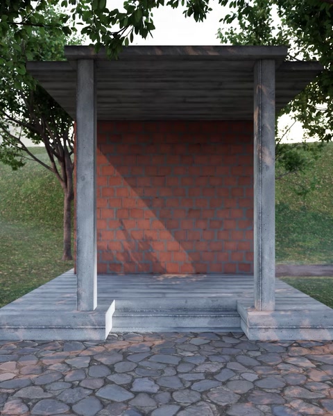 Una singola colonna e piedistallo completati si ergono soli contro un muro di mattoni.