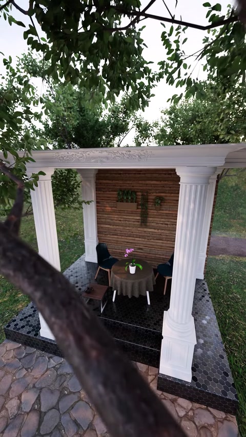 Ampia vista della struttura della pergola con colonne che incorniciano l'area di seduta esterna.