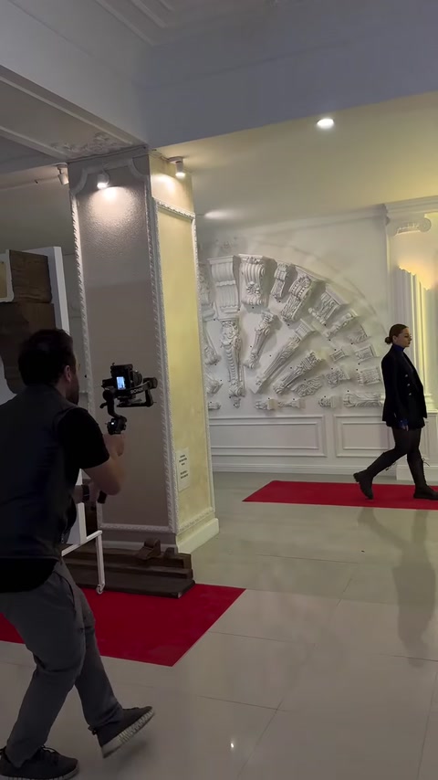 Showroom featuring arches, columns, and wall ornaments