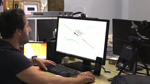 Placement of decorative arch components is prepared on the screen drawing