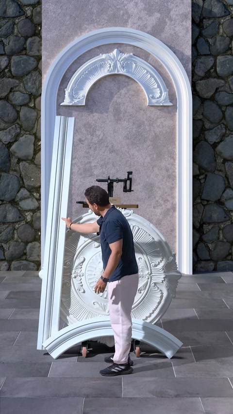 Arched doorway design taking shape with medallion and moldings