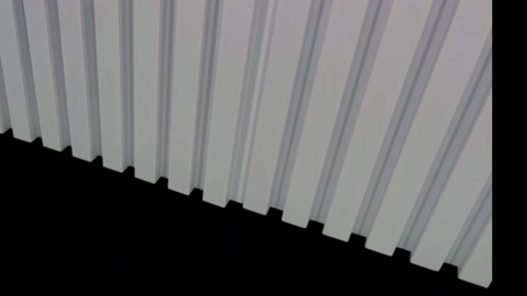 White vertical fluted wall panel edge and profile structure is displayed.
