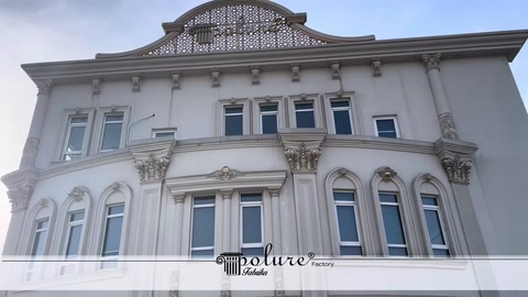 Building roof and decorative exterior façade elements on the upper floor