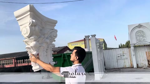 Curved edge profile of a white column capital displayed from above
