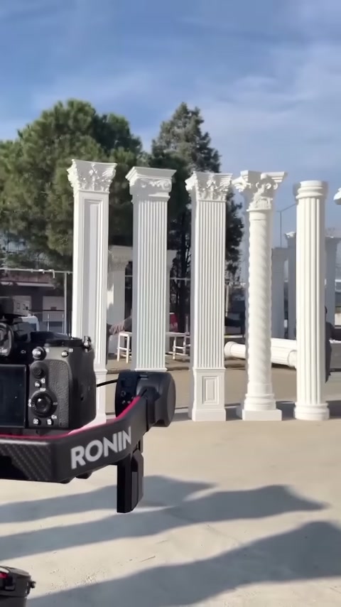 The camera on a mount captures columns with different shaft forms