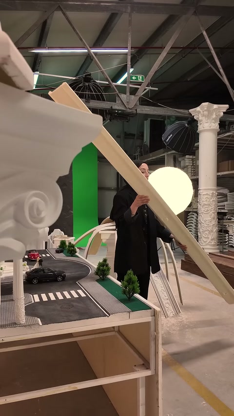 Two flat polyurethane profiles are stacked on top of each other on a display stand