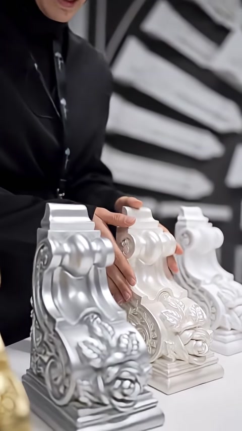 Silver-colored and white-primed corbel examples are displayed together
