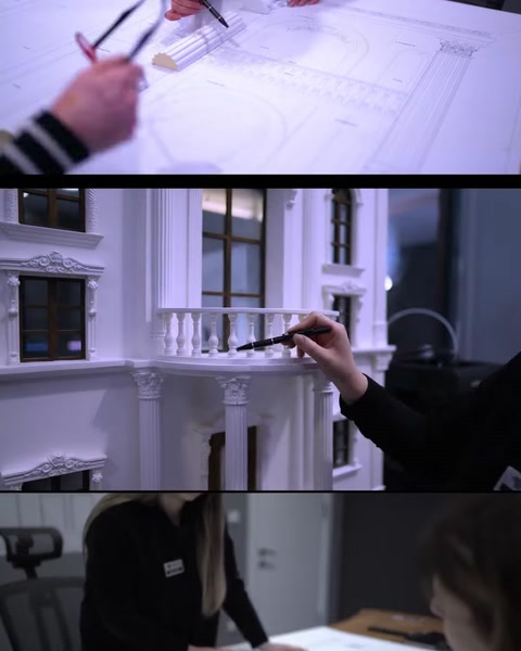 Hand pointing at balcony railing detail on a facade drawing