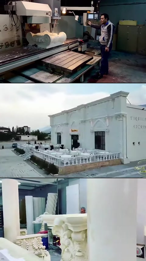 A cutting bench, the corner facade of the building and vertical profile stocks are visible.