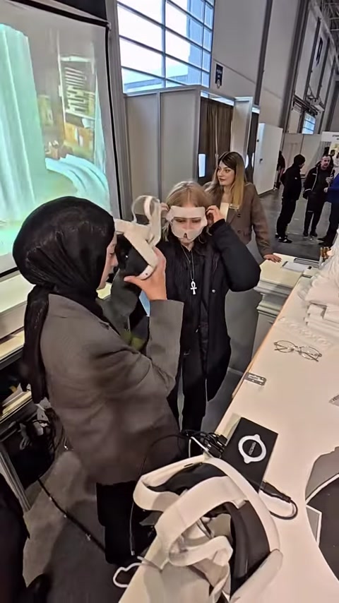 Woman wearing VR headset guided through virtual neoclassical interior
