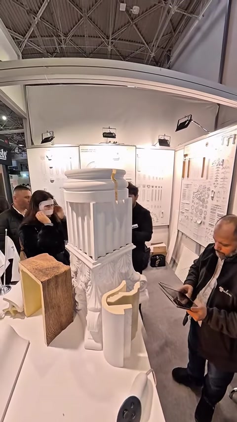 Full-height polyurethane column displayed beside wood texture sample block