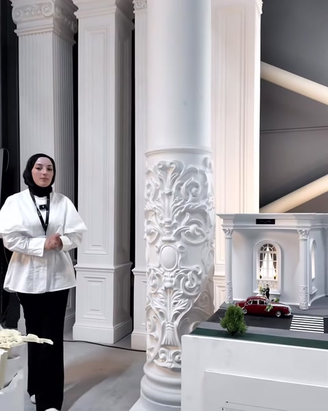 Fluted columns, ornate bases, and classical capitals are displayed together.
