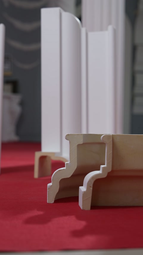 Cutaway decorative profiles reveal their shapes and hollow interior construction