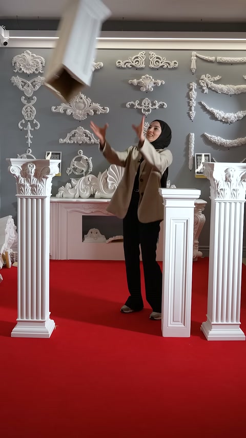 Fluted column piece is released into the air among the displayed columns.