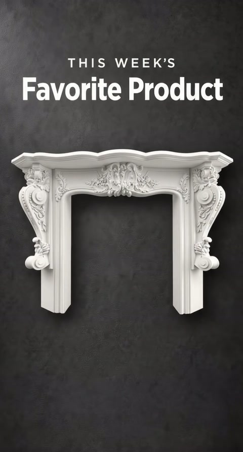 Symmetrical front view displays the ornate mantel surround against gray.