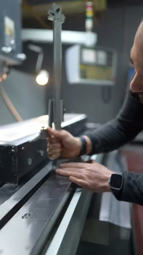 Worker holds the vertical control lever while continuing surface measurement