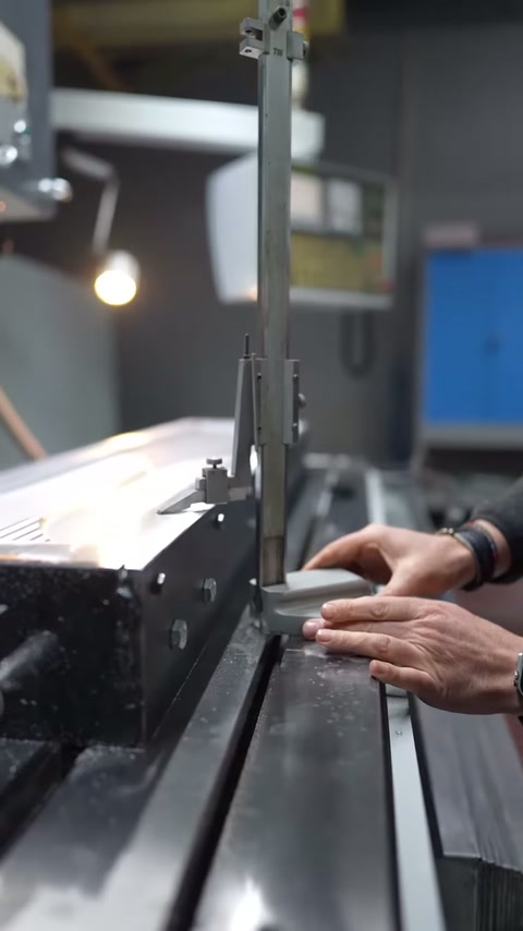 Operator adjusts the position of the control device at the panel edge