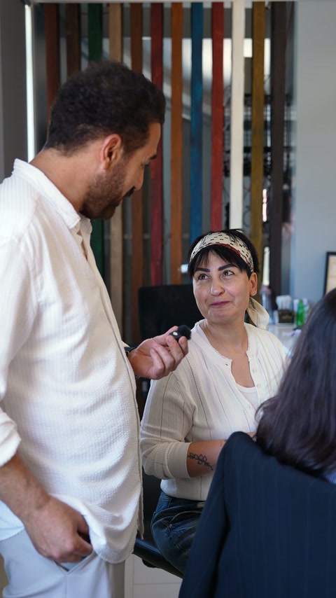Selda shares her thoughts on product selection in an office meeting.