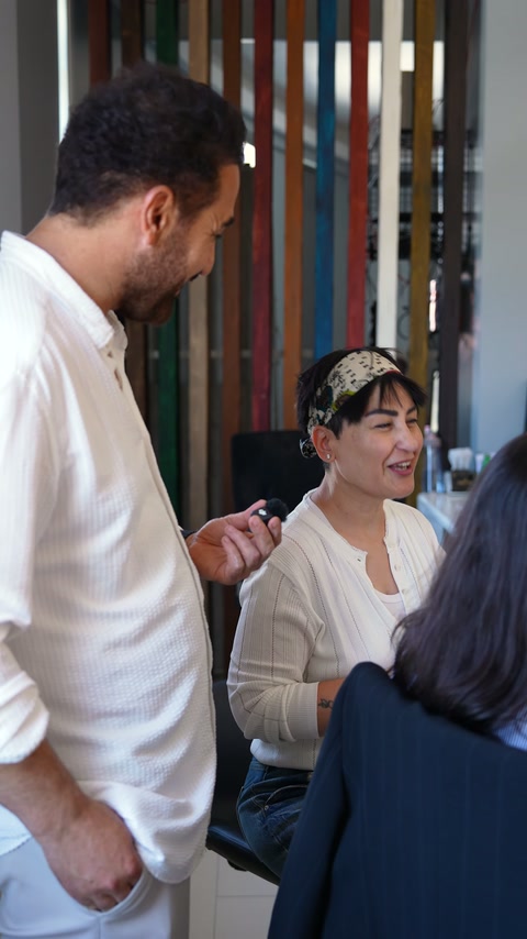 Selda discusses interior details with the showroom team.