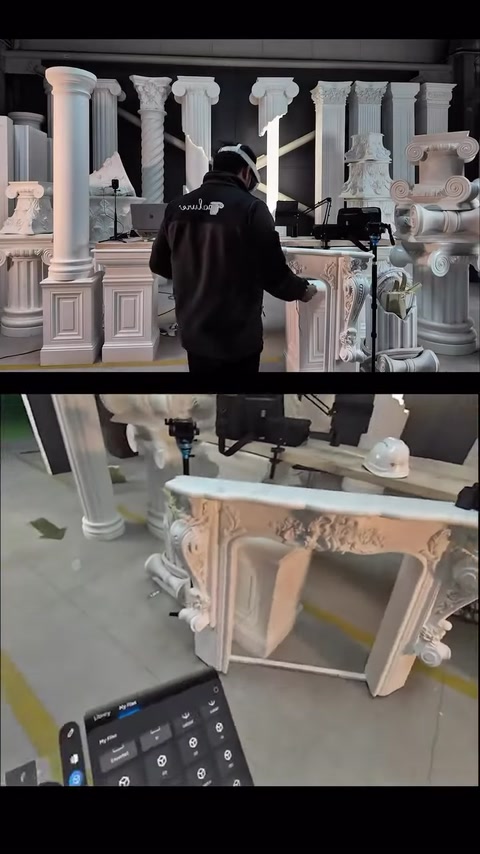 The decorative fireplace, columns and camera are viewed from a different angle.