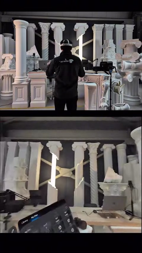 The columns and fireplace arrangement in the workshop are viewed through VR.