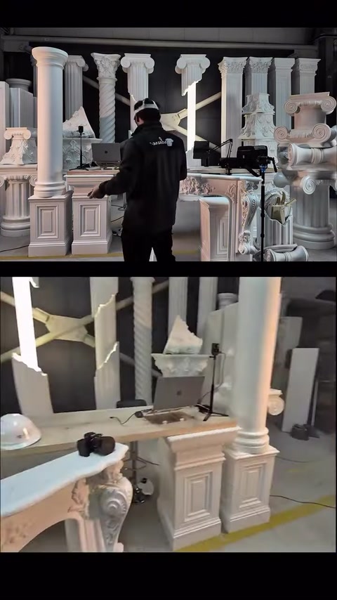 A camera model is shown together with the fireplace mantel and columns.