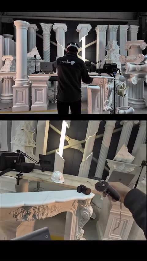 A hand controller is pointed at the model on the fireplace mantel.