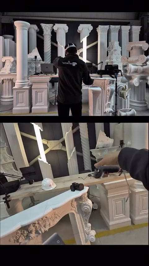 An object in front of the decorative fireplace is selected with a VR controller.