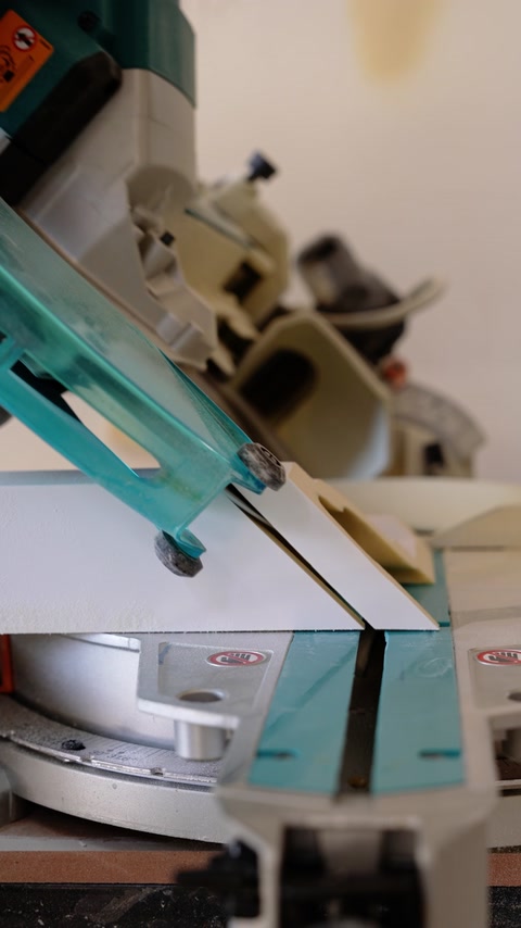 Production tool cuts and refines a small decorative profile.