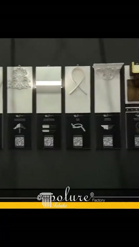 Video mostra campioni di finiture murali in poliuretano di tipo espositivo presso uno stand fieristico