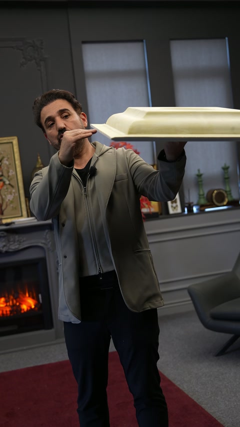 Presenter displays the shallow side profile of a square ceiling dome