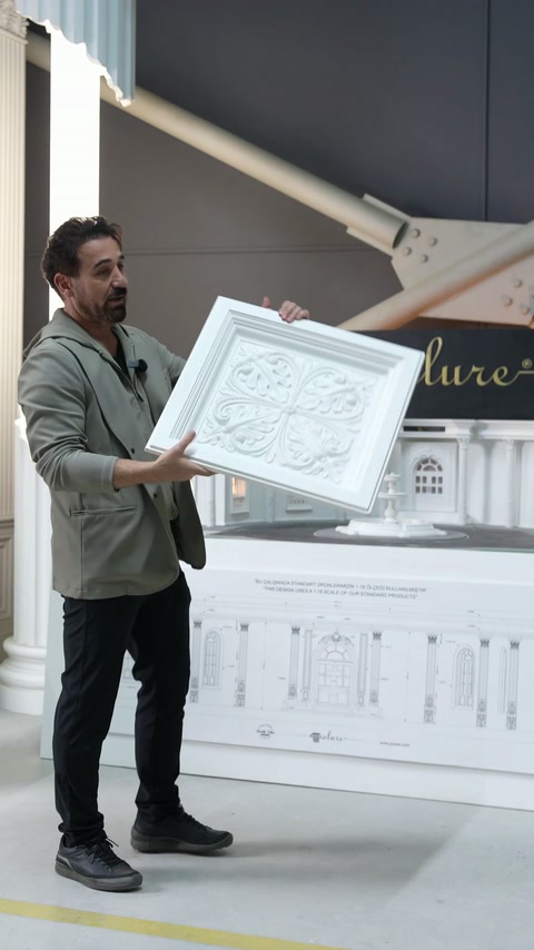 Square dome panel displays four symmetrical floral relief medallions
