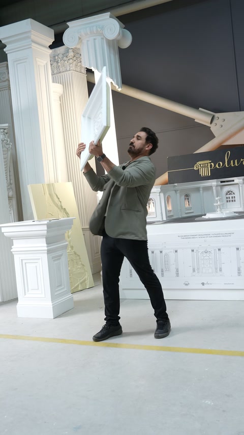 Square dome held overhead demonstrates its intended ceiling orientation