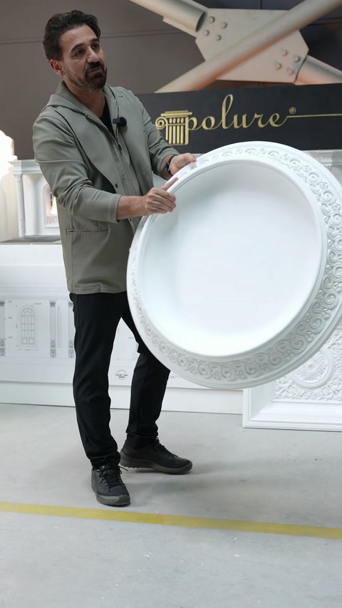 Circular ceiling dome combines a plain centre with ornamental edging