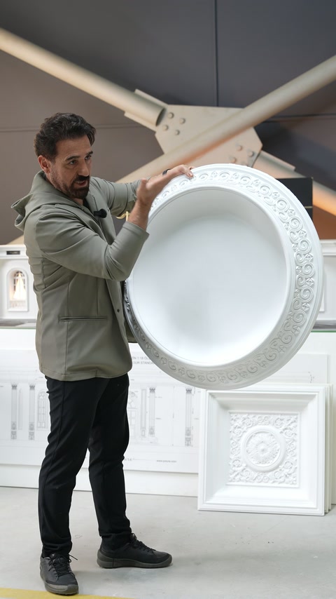 Presenter indicates the scrolling relief around the circular dome border