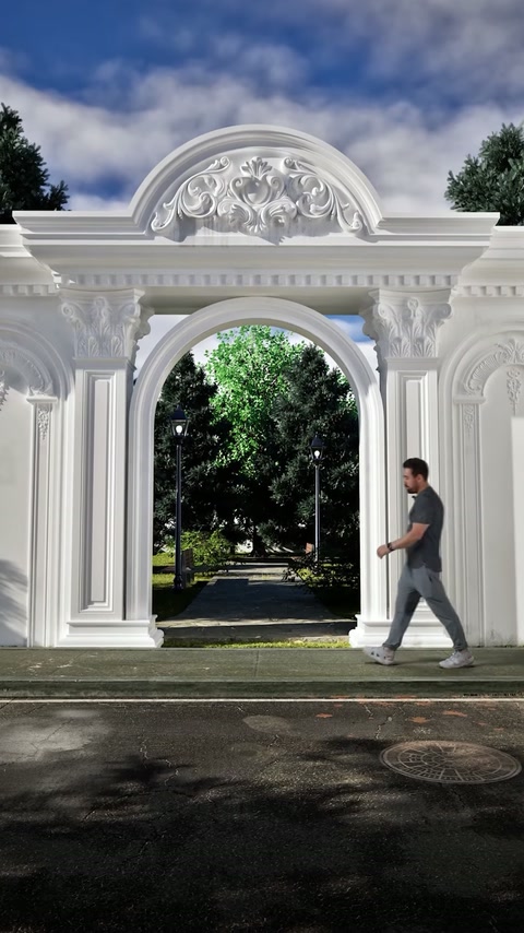 L'operatore cammina attraverso l'apertura dell'ingresso ad arco completato.