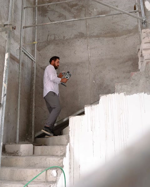 Digital data is collected by scanning the wall in the staircase area