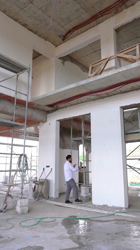 Structural openings and scanning work are visible inside the villa